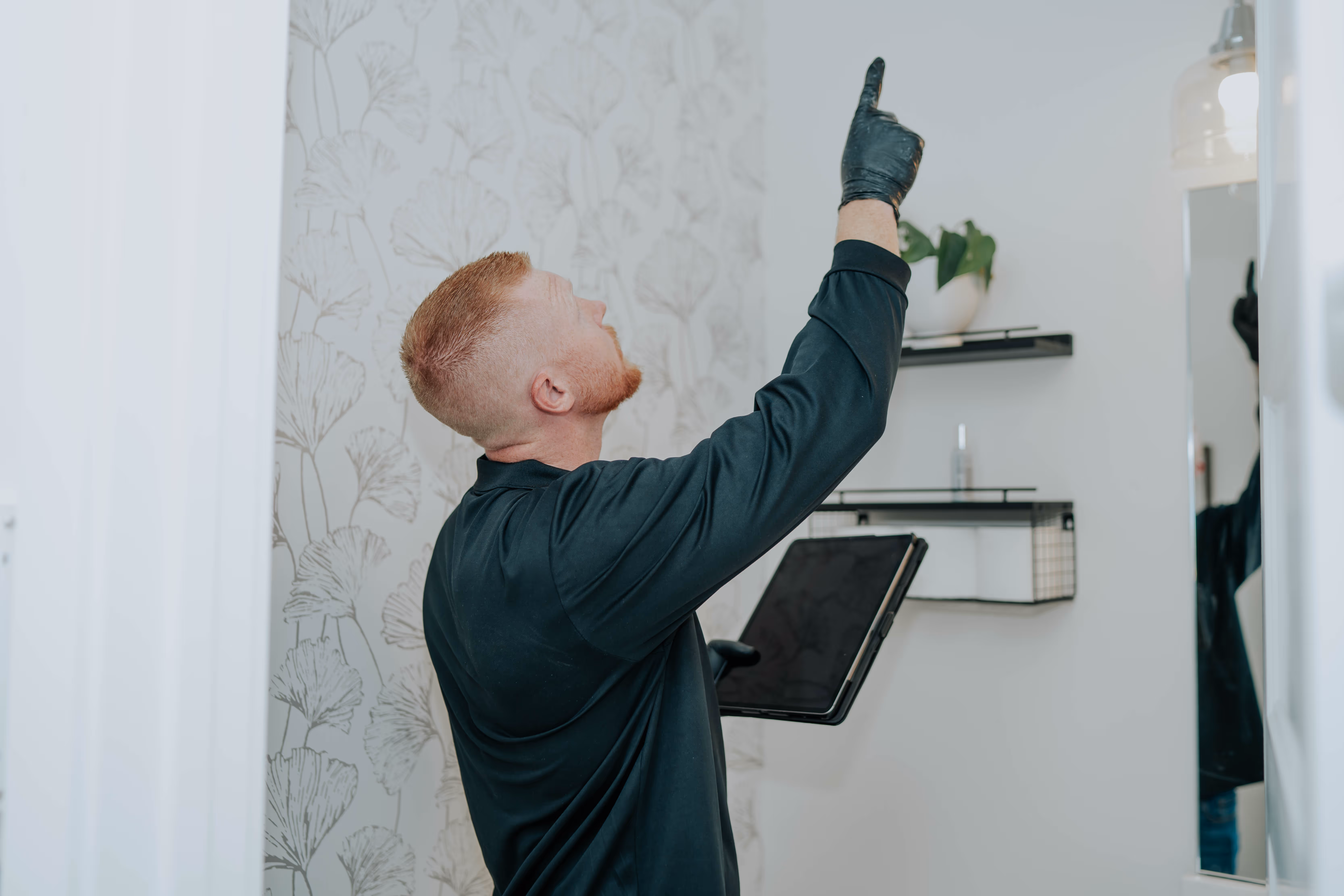 Pure Mold Masters specialist inspecting a property